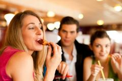 bigstock-Friends-in-Restaurant-eating-f-10164950
